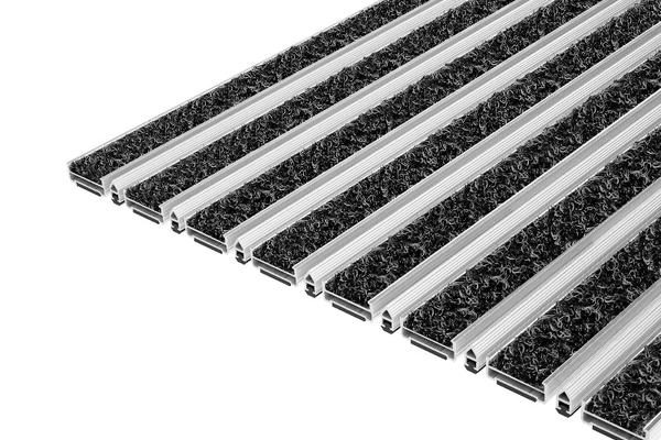 Top Clean CLASSIC WAVE: Die preiswerte Eingangsmatte Top Clean CLASSIC WAVE mit der WAVE-Einlage aus 100% Polyamid sorgt aufgrund der bürstenden Eigenschaften für hohe Reinigungsleistung bei kleinen Budgets. 